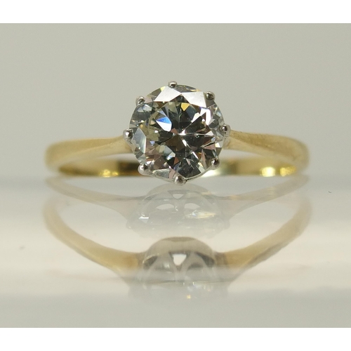 648 - An 18ct and platinum diamond solitaire