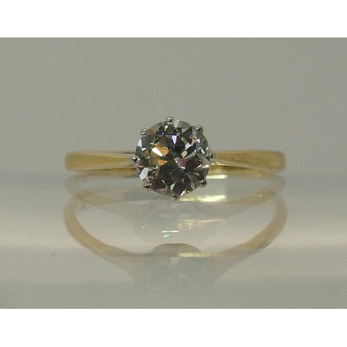 648 - An 18ct and platinum diamond solitaire