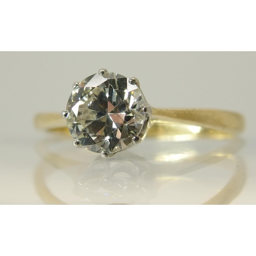 648 - An 18ct and platinum diamond solitaire