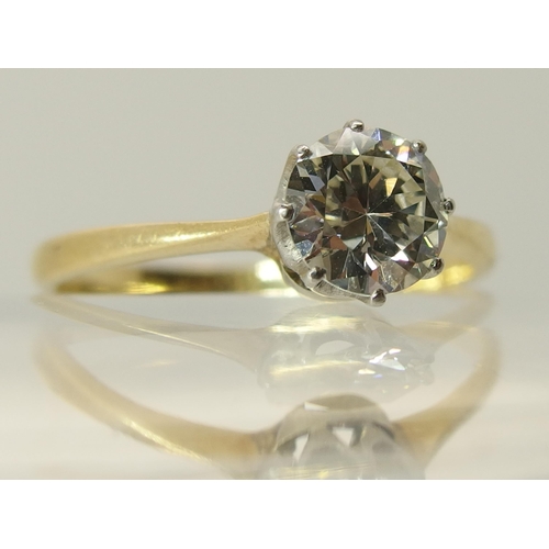 648 - An 18ct and platinum diamond solitaire