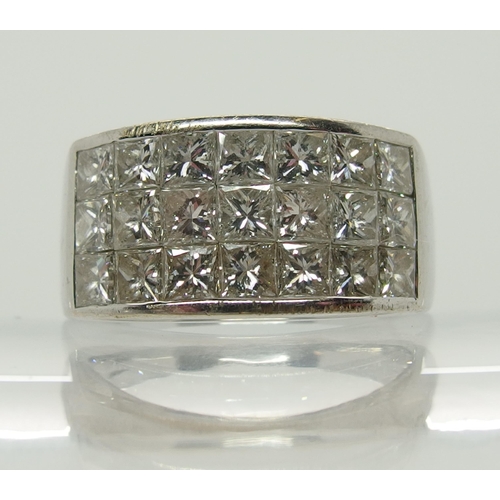 658 - An 18ct white gold and princess cut diamond ring made by Eric Smith