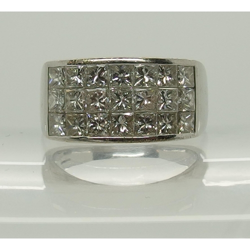 658 - An 18ct white gold and princess cut diamond ring made by Eric Smith