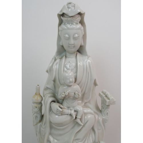 66 - A Chinese blanc de chine figure of Guanyin