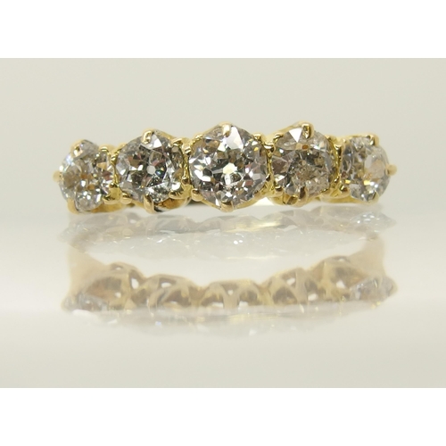 660 - An 18ct gold five stone diamond ring