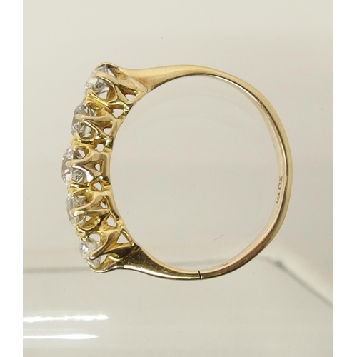 660 - An 18ct gold five stone diamond ring