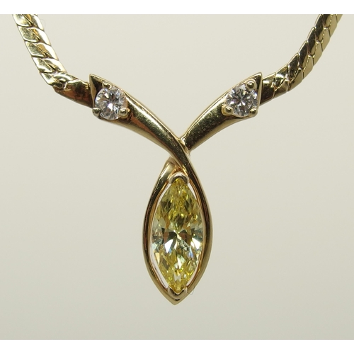 661 - A 14ct gold yellow diamond set necklet