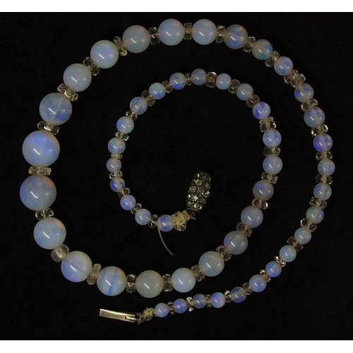 662 - A string of opal beads