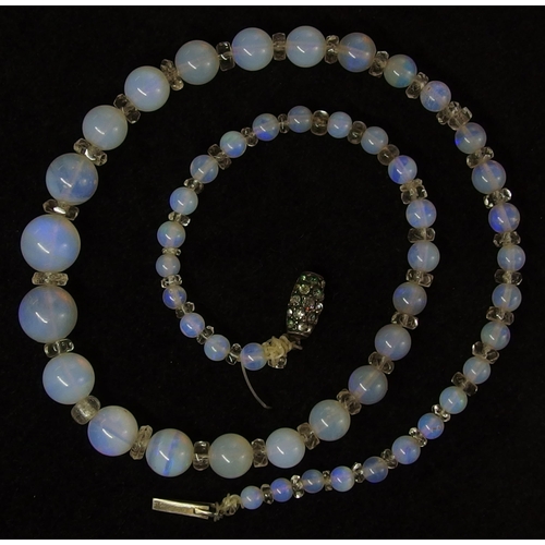 662 - A string of opal beads