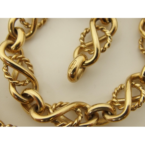 669 - A 9ct gold fancy neckchain