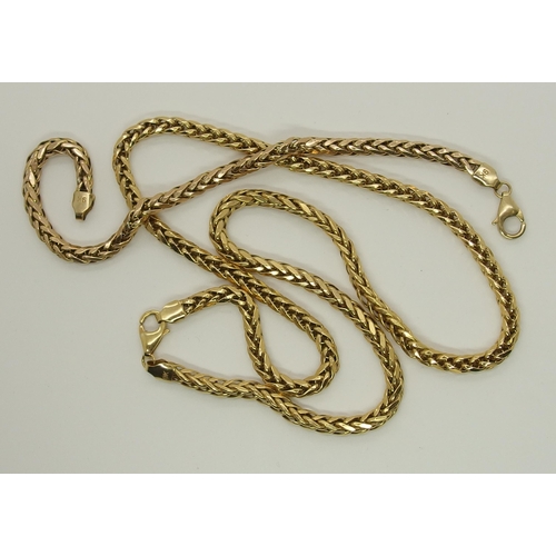 689 - A 9ct gold fancy link necklace and bracelet set