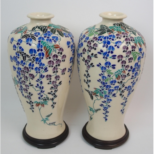 69 - A pair of Japanese baluster vases