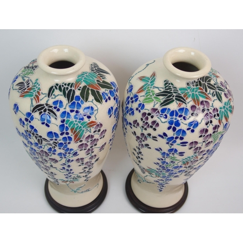 69 - A pair of Japanese baluster vases