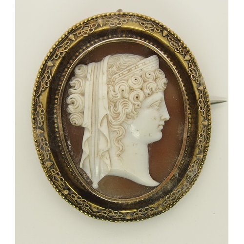 690 - A yellow metal mounted shell cameo of a classical maiden