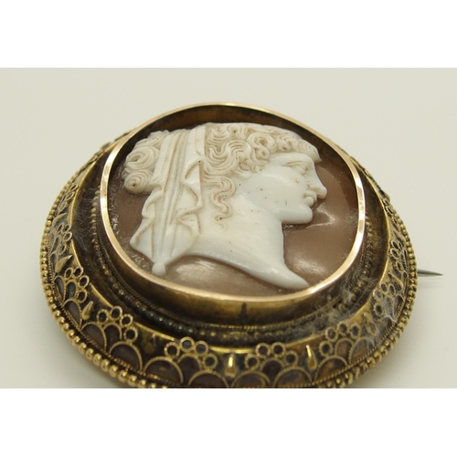 690 - A yellow metal mounted shell cameo of a classical maiden