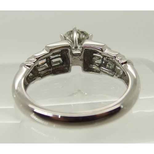 694 - An 18ct white gold diamond ring