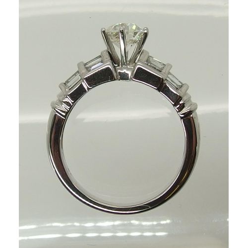 694 - An 18ct white gold diamond ring