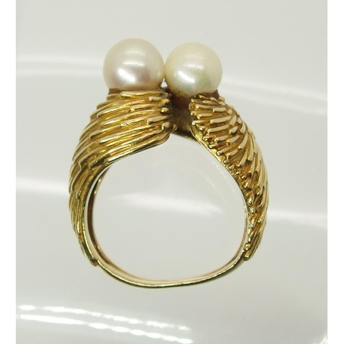 695 - A bright yellow metal twin pearl ring