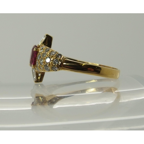 699 - A bright yellow metal diamond and pink sapphire dress ring