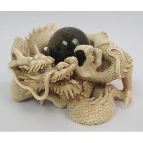 70 - A Japanese ivory model of a dragon