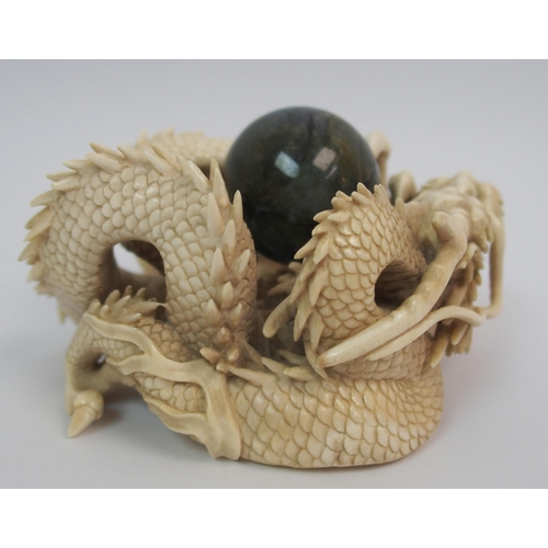 70 - A Japanese ivory model of a dragon