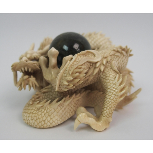 70 - A Japanese ivory model of a dragon