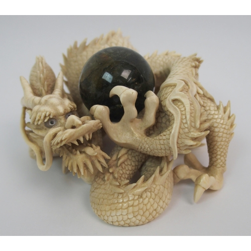 70 - A Japanese ivory model of a dragon