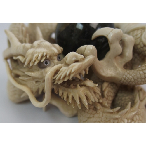 70 - A Japanese ivory model of a dragon