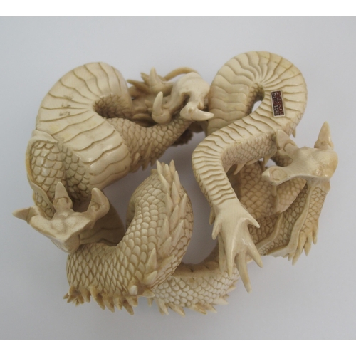 70 - A Japanese ivory model of a dragon