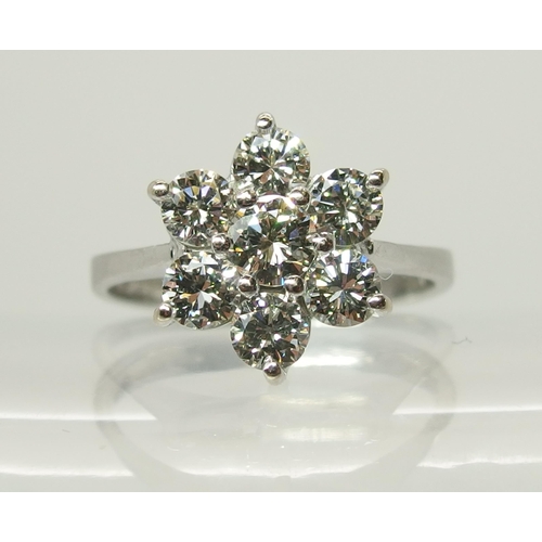 705 - An 18ct white gold diamond flower cluster ring