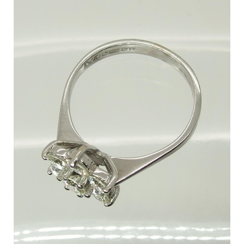 705 - An 18ct white gold diamond flower cluster ring