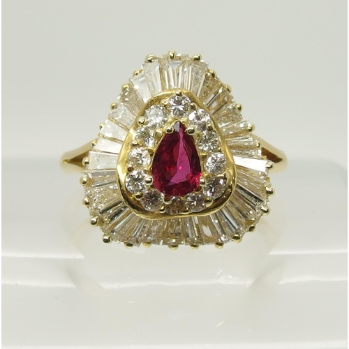 707 - A bright yellow metal diamond and ruby dress ring