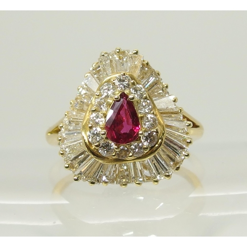 707 - A bright yellow metal diamond and ruby dress ring