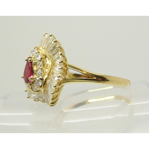 707 - A bright yellow metal diamond and ruby dress ring