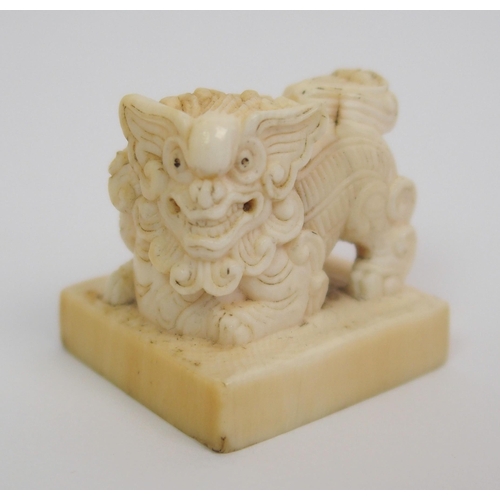 72 - A Chinese ivory shishi seal