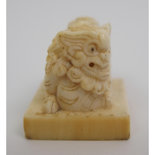 72 - A Chinese ivory shishi seal