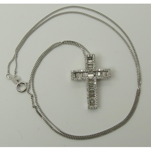 721 - An 18ct white gold diamond set cross