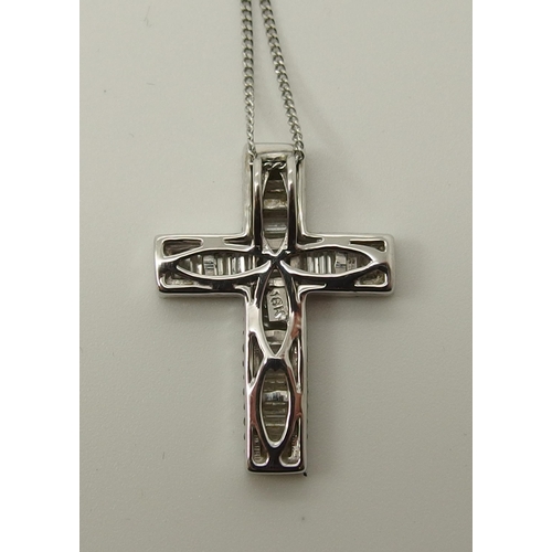 721 - An 18ct white gold diamond set cross