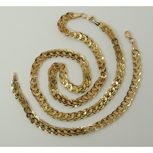 722 - A 9ct gold leaf design fancy neck chain with matching bracelet