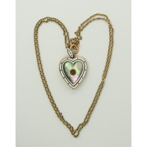 726 - A yellow metal heart shaped pendant