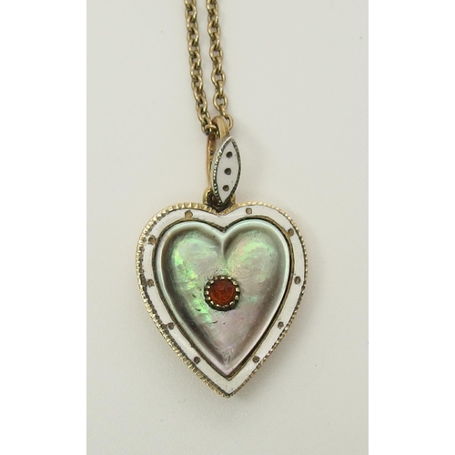 726 - A yellow metal heart shaped pendant