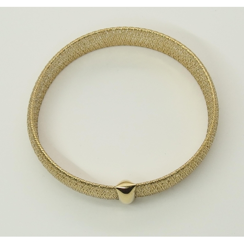 727 - An 18ct gold Italian woven bracelet