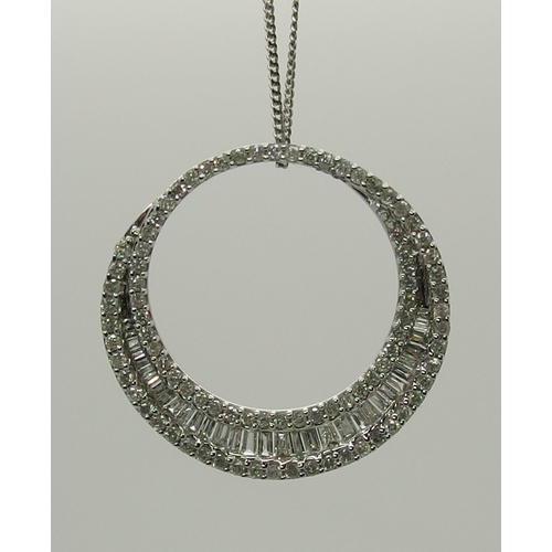 729 - A 9ct white gold diamond set circle pendant