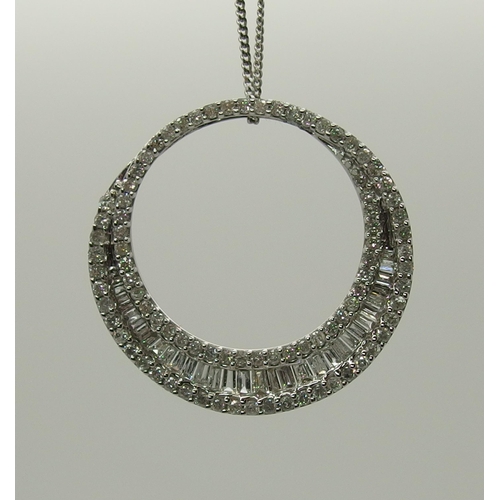 729 - A 9ct white gold diamond set circle pendant