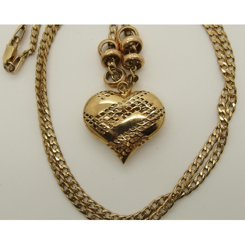 730 - A 9ct gold puffed heart pendant and chain