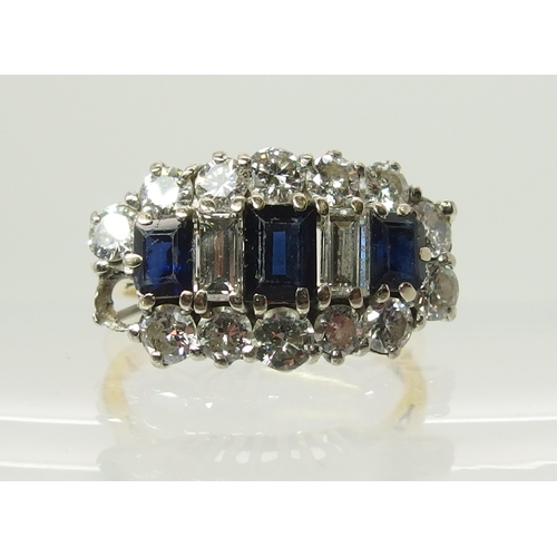 732 - An 18ct gold diamond and sapphire cluster ring