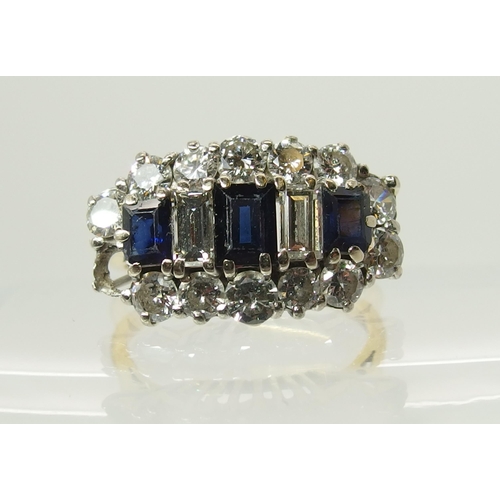 732 - An 18ct gold diamond and sapphire cluster ring