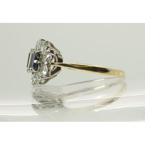 732 - An 18ct gold diamond and sapphire cluster ring