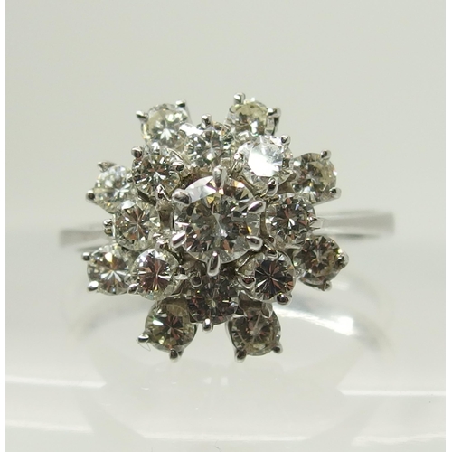 733 - An 18ct gold diamond cluster ring