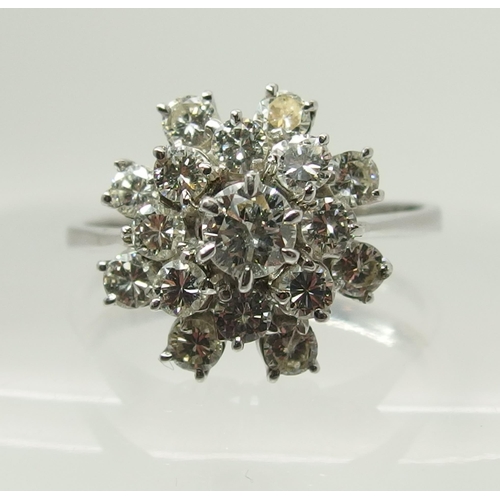 733 - An 18ct gold diamond cluster ring