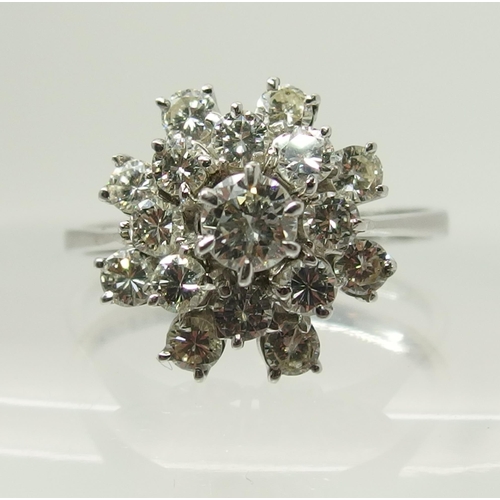 733 - An 18ct gold diamond cluster ring